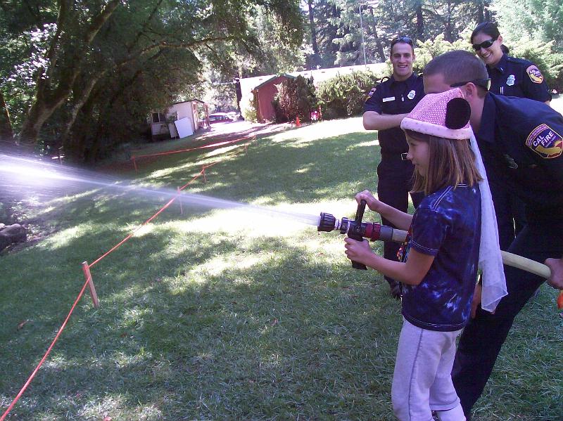 106_0523.jpg - Learning to work the fire hose