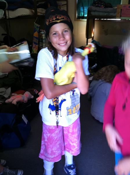 img_2092.jpg - Kayla loves her rubber chicken from counselor Hans