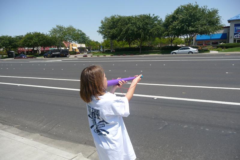 p1070230.jpg - Kayla blowing her horn for MDA Fill the Boot