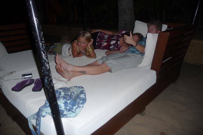 p1080161.jpg - Lounging on a palapa on the beach