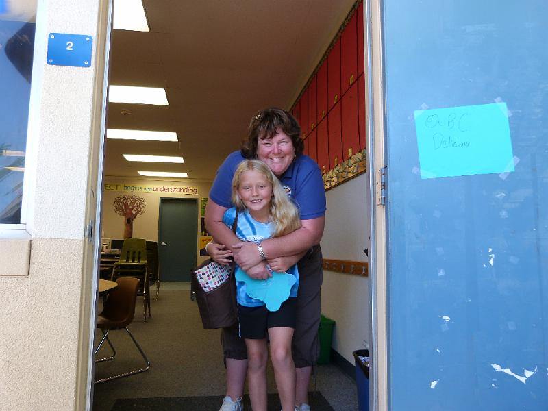 p1010295.jpg - Last day of school, Kinsey gets a goodbye hug from her teacher