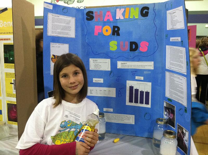 img_1379.jpg - Kayla getting ready to have her science fair project judged