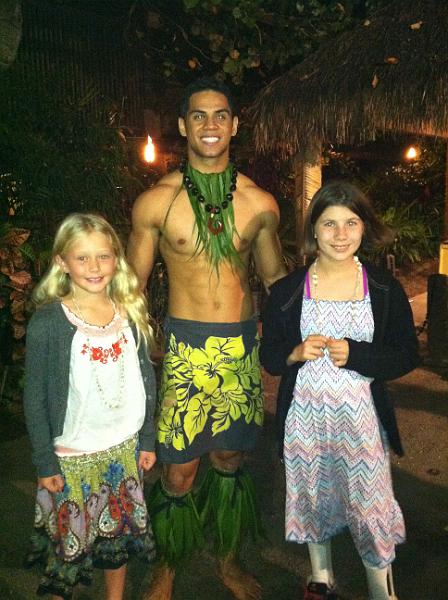 img_3539.jpg - Photo op with one of the dancers at the luau