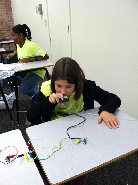 img_3409.jpg - Kayla learning about circuits at Expanding Your Horizons conference